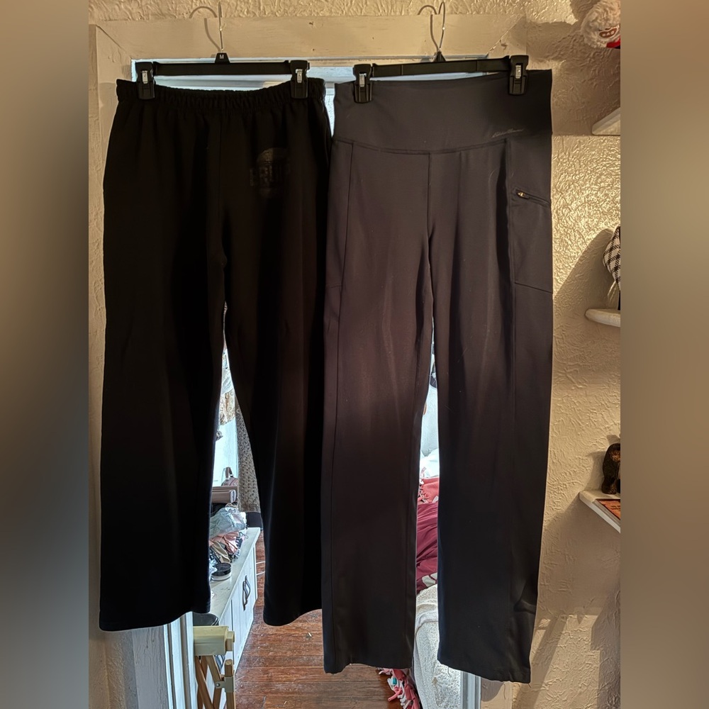 Pair of Medium Sweatpants. Blue Eddie Bauer, black Gildan with Bruin logo